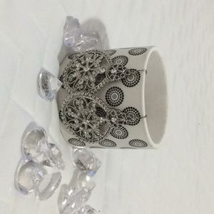 Silver coloured earrings